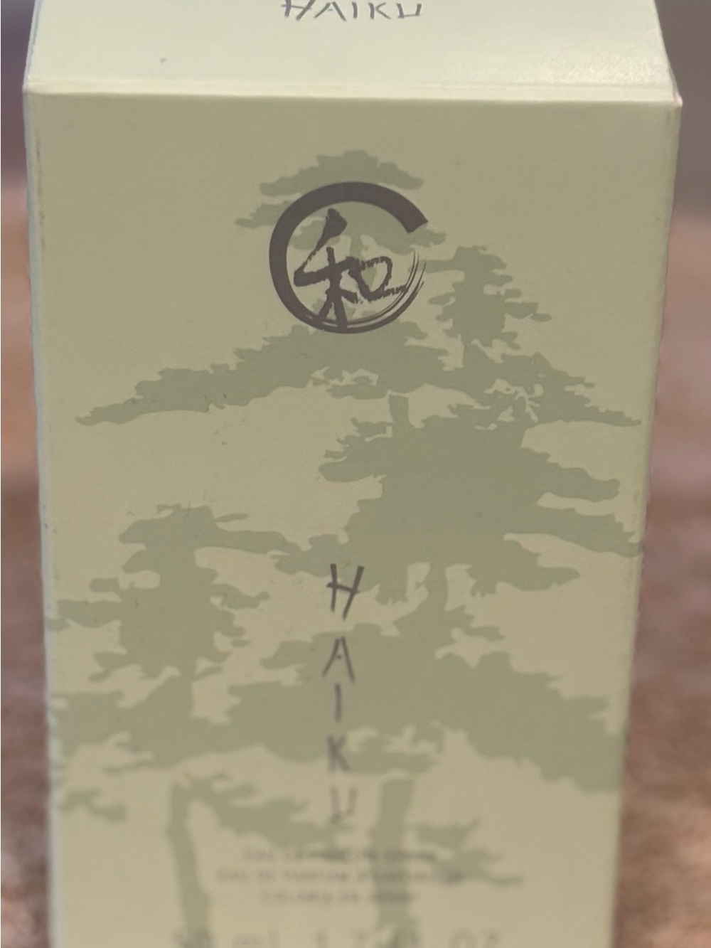 Haiku perfume pale green fragrance box with dark green logo - Avon